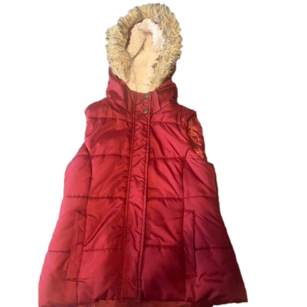 WOMEN’S puffer vest with zipper and button closure  - used. Like new